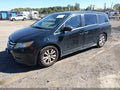 2014 Honda Odyssey — photo 2 of 21 | VIN 5FNRL5H6XEB121650