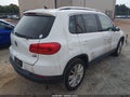 2016 Volkswagen Tiguan — photo 4 of 12 | VIN WVGBV7AX4GW523801