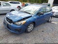2014 Subaru Impreza — photo 2 of 16 | VIN JF1GPAA66E8227355