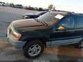 2000 Jeep Grand Cherokee — photo 13 of 16 | VIN 1J4GW48S4YC263333