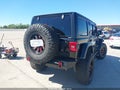 2019 Jeep Wrangler Unlimited — photo 4 of 16 | VIN 1C4HJXFN0KW521036