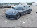 2023 Tesla Model 3 — photo 2 of 15 | VIN 5YJ3E1EA4PF700184
