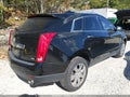 2014 Cadillac SRX — photo 4 of 19 | VIN 3GYFNEE39ES534443