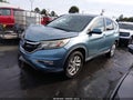 2015 Honda CR-V — photo 2 of 16 | VIN 2HKRM4H59FH632638