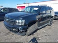 2011 Chevrolet Tahoe — photo 2 of 16 | VIN 1GNSKBE06BR106434