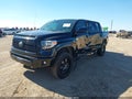 2018 Toyota Tundra — photo 2 of 16 | VIN 5TFAW5F14JX722337