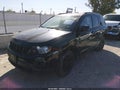 2014 Jeep Compass — photo 2 of 14 | VIN 1C4NJCBA0ED814207