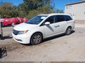 2015 Honda Odyssey — photo 2 of 16 | VIN 5FNRL5H65FB127471