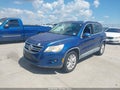 2009 Volkswagen Tiguan — photo 2 of 11 | VIN WVGBV75N39W000247