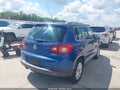 2009 Volkswagen Tiguan — photo 4 of 11 | VIN WVGBV75N39W000247