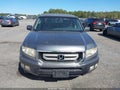 2011 Honda Ridgeline — photo 12 of 16 | VIN 5FPYK1F56BB001493