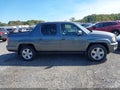 2011 Honda Ridgeline — photo 13 of 16 | VIN 5FPYK1F56BB001493