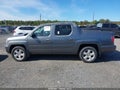 2011 Honda Ridgeline — photo 14 of 16 | VIN 5FPYK1F56BB001493