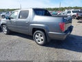 2011 Honda Ridgeline — photo 3 of 16 | VIN 5FPYK1F56BB001493