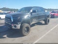 2012 Toyota Tundra — photo 2 of 17 | VIN 5TFDW5F1XCX246756