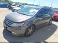 2013 Honda Odyssey — photo 2 of 21 | VIN 5FNRL5H94DB079629
