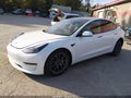 2022 Tesla Model 3 — photo 2 of 14 | VIN 5YJ3E1EB1NF324565