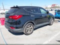 2015 Hyundai Santa Fe — photo 4 of 16 | VIN 5XYZT3LB1FG265848
