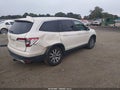 2019 Honda Pilot — photo 4 of 16 | VIN 5FNYF5H57KB022080