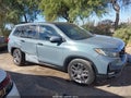 2022 Honda Passport — photo 13 of 16 | VIN 5FNYF7H5XNB002549