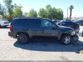 2004 GMC Envoy — photo 13 of 16 | VIN 1GKDS13S042115727