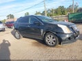 2016 Cadillac SRX — photo 1 of 16 | VIN 3GYFNBE31GS551920