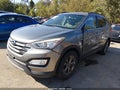2014 Hyundai Santa Fe — photo 2 of 21 | VIN 5XYZUDLB4EG127769