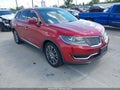 2016 Lincoln MKX — photo 1 of 16 | VIN 2LMTJ6LR8GBL28038