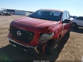 2022 Nissan Titan — photo 2 of 16 | VIN 1N6AA1EE3NN107191