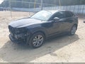 2023 Mazda CX-30 — photo 2 of 18 | VIN 3MVDMBBM6PM574836