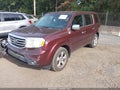 2014 Honda Pilot — photo 2 of 16 | VIN 5FNYF4H45EB029700