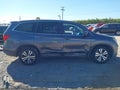 2017 Honda Pilot — photo 13 of 16 | VIN 5FNYF6H31HB021990