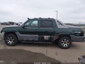 2002 Chevrolet Avalanche — photo 15 of 17 | VIN 3GNGK23G12G163355