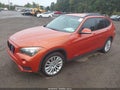 2013 BMW X1 — photo 2 of 10 | VIN WBAVL1C56DVR84271
