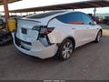 2022 Tesla Model Y — photo 4 of 17 | VIN 7SAYGDEF4NF347314