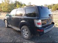 2008 Mercury Mariner — photo 3 of 11 | VIN 4M2CU81Z38KJ45881