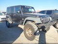 2014 Jeep Wrangler Unlimited — photo 1 of 16 | VIN 1C4BJWFG8EL274887