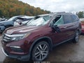 2017 Honda Pilot — photo 2 of 16 | VIN 5FNYF6H98HB024065