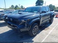 2025 Toyota Tacoma — photo 2 of 16 | VIN 3TYLB5JN0ST069385