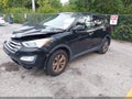 2015 Hyundai Santa Fe — photo 2 of 17 | VIN 5XYZUDLB3FG243031