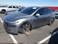 2026 Tesla Model Y — photo 2 of 19 | VIN 7SAYGDED5TF439382