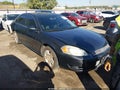 2014 Chevrolet Impala Limited — photo 1 of 16 | VIN 2G1WB5E3XE1112345