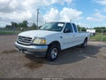 2003 Ford F-150 — photo 2 of 12 | VIN 1FTRX17L03NB53171