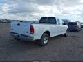 2003 Ford F-150 — photo 4 of 12 | VIN 1FTRX17L03NB53171