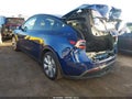 2023 Tesla Model Y — photo 3 of 18 | VIN 7SAYGAEE5PF832182