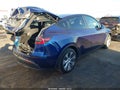 2023 Tesla Model Y — photo 4 of 18 | VIN 7SAYGAEE5PF832182