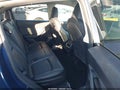 2023 Tesla Model Y — photo 8 of 18 | VIN 7SAYGAEE5PF832182