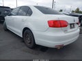 2014 Volkswagen Jetta — photo 3 of 13 | VIN 3VW2K7AJ1EM304622