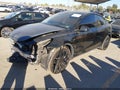 2022 Tesla Model Y — photo 2 of 19 | VIN 7SAYGAEE1NF505968
