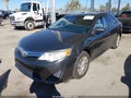 2014 Toyota Camry — photo 2 of 17 | VIN 4T4BF1FK8ER412657